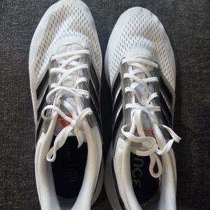Adidas White Mesh Sneakers with Black Stripes